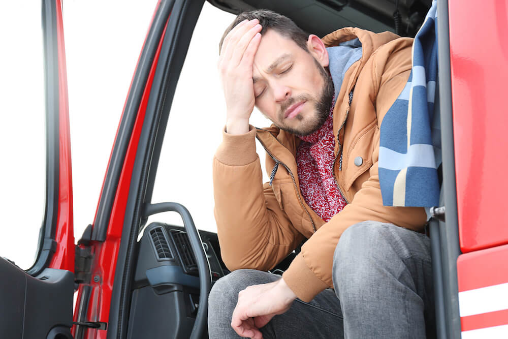 8 tips to prevent back pain as a tow truck driver