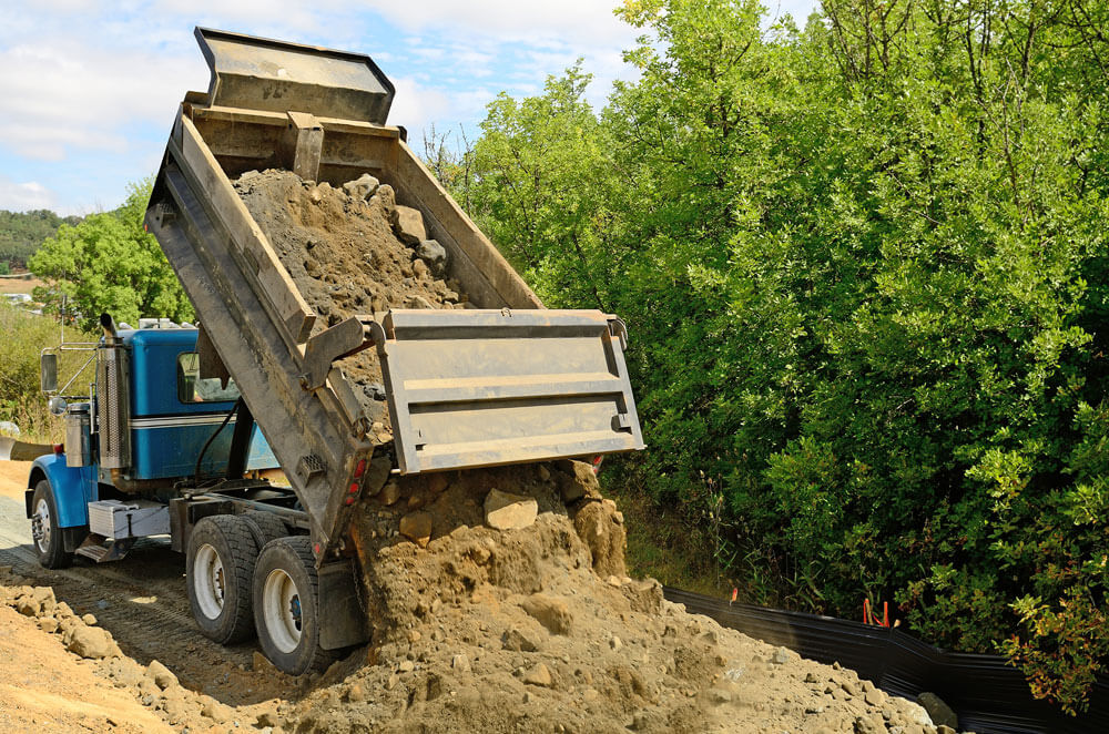 What Affects the Cost of Dump Truck Insurance? | InsuranceHub